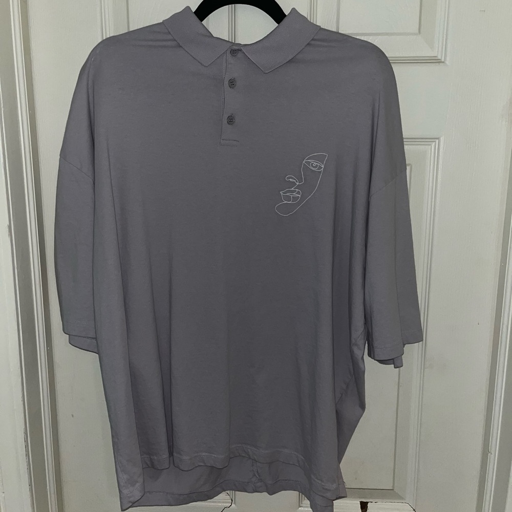 Mens oversized lilac purple polo with face design from ASOS design